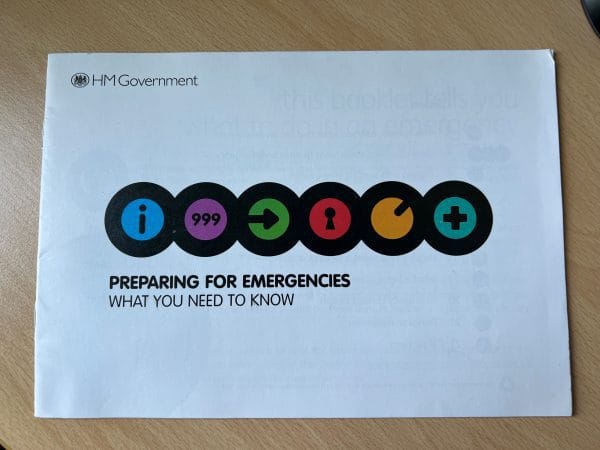 HM Government emergency preparedness leaflet with icons and instructions.