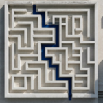 Aerial view of a stone architectural maze with a clear navy blue path marked through it, representing navigation through complex ISO standards