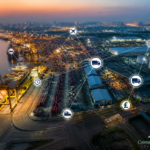 Aerial view of a port at dusk with a network of connected transport and logistics icons overlaid, illustrating supply chain interdependency.